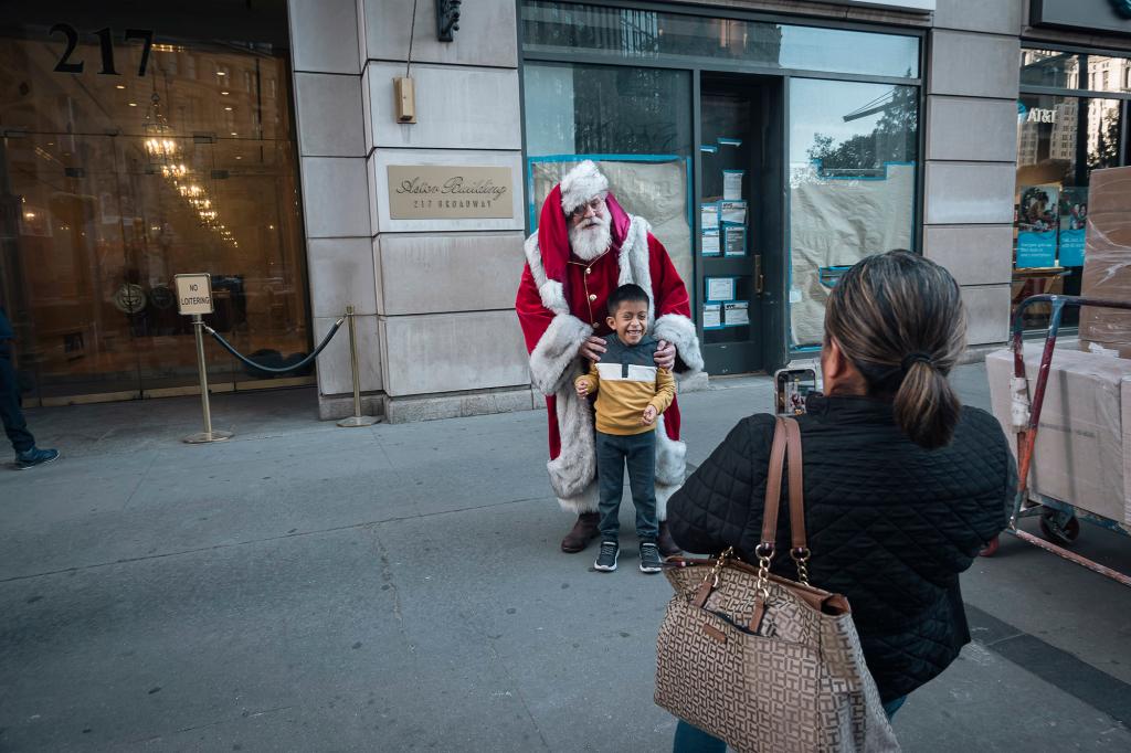 lawyer Dana "Santa" Friedman, dressed as Santa Claus at his office in the Astor building, lower Manhattan. 217 Broadway, New York, NY