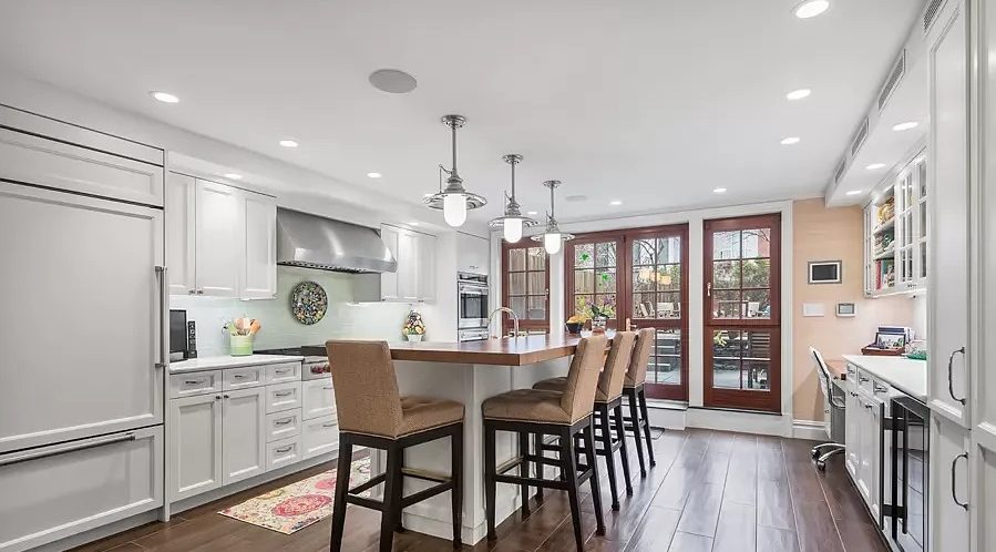 The kitchen with breakfast bar seating.