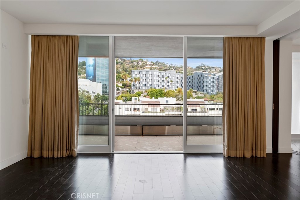 The living area leads to the balcony.