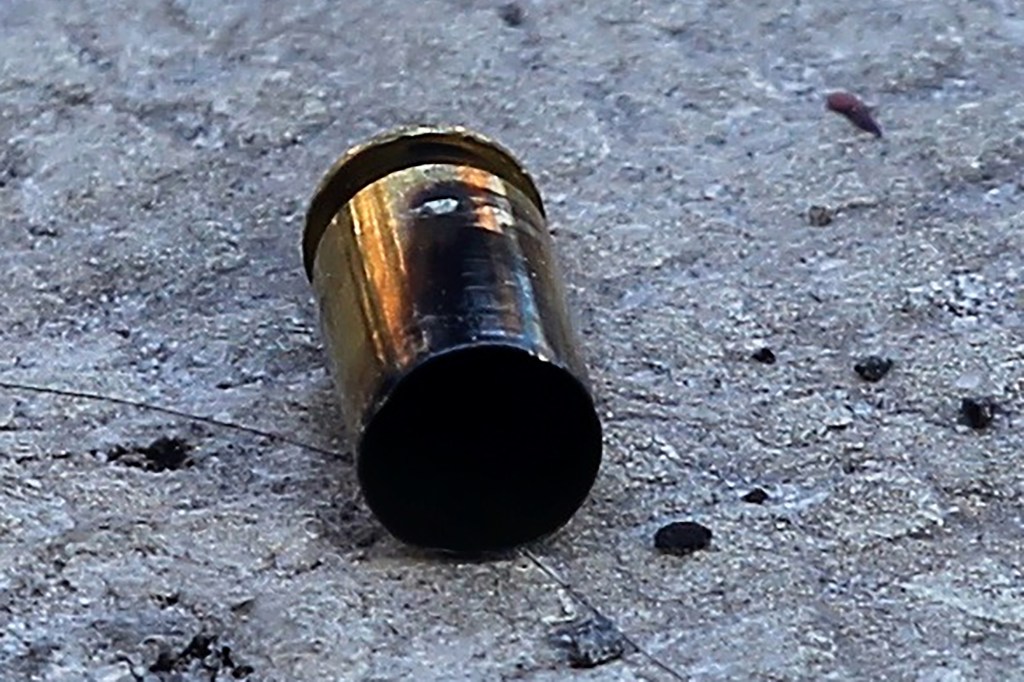 The loose shell casing found on the sidewalk after Ortega was shot.