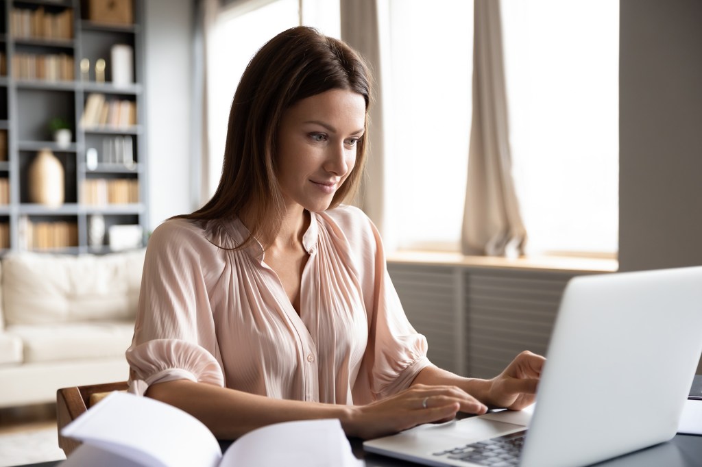 Woman on computer.