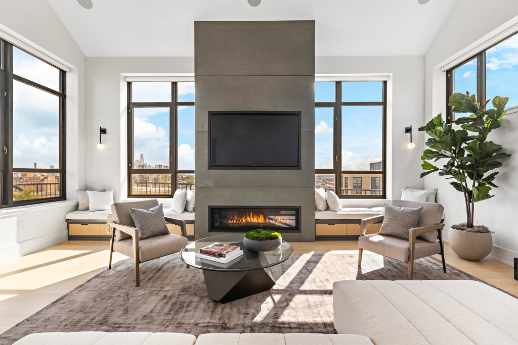 Perks include a floor-to-ceiling fireplace.