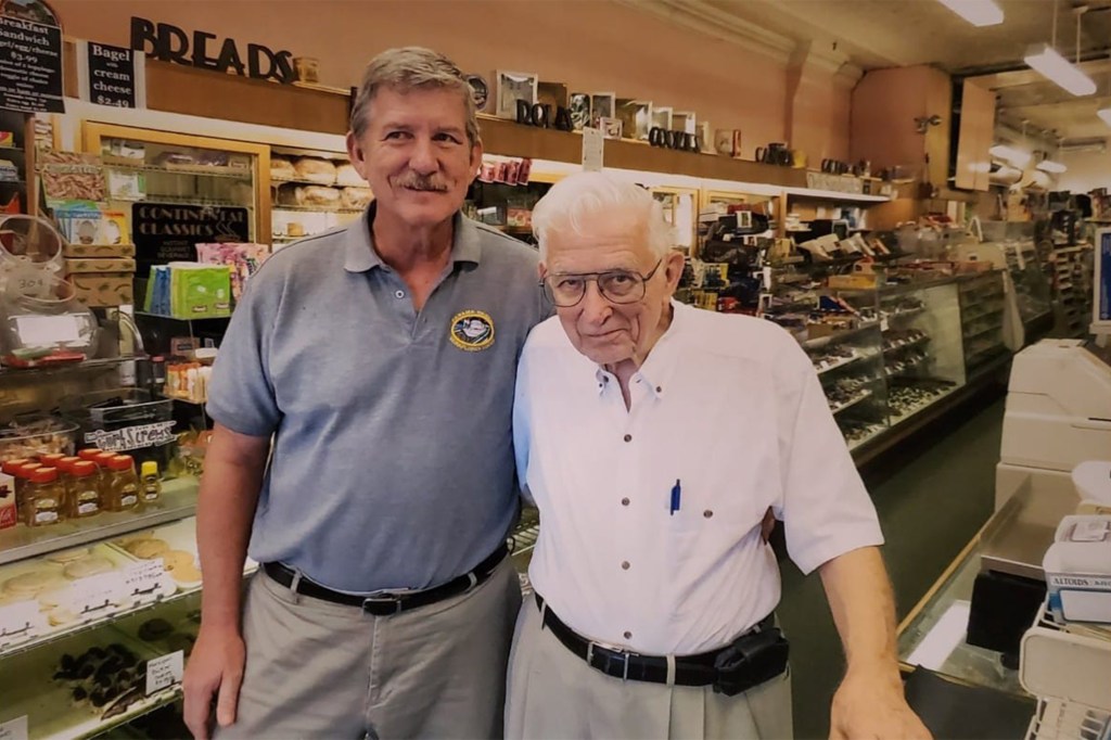 Davis Gibson, left, and his father Allyn Gibson Sr. are seen in an undated photo posted on Facebook by Gibson's Food Mart and Bakery. 