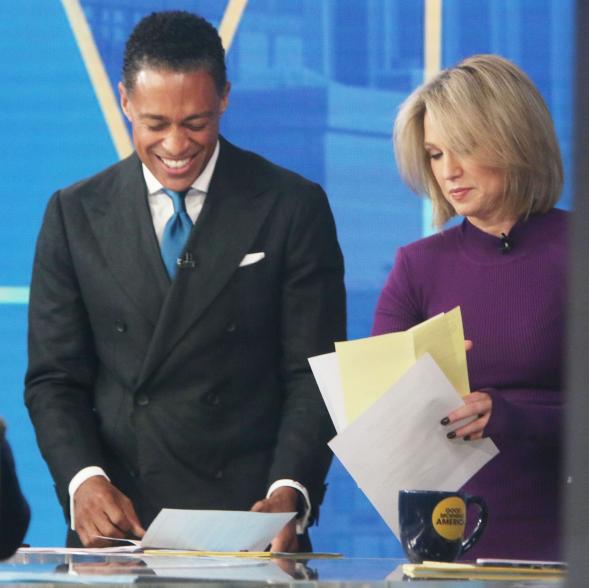 A picture of Good Morning America hosts T.J. Holmes and Amy Robach.