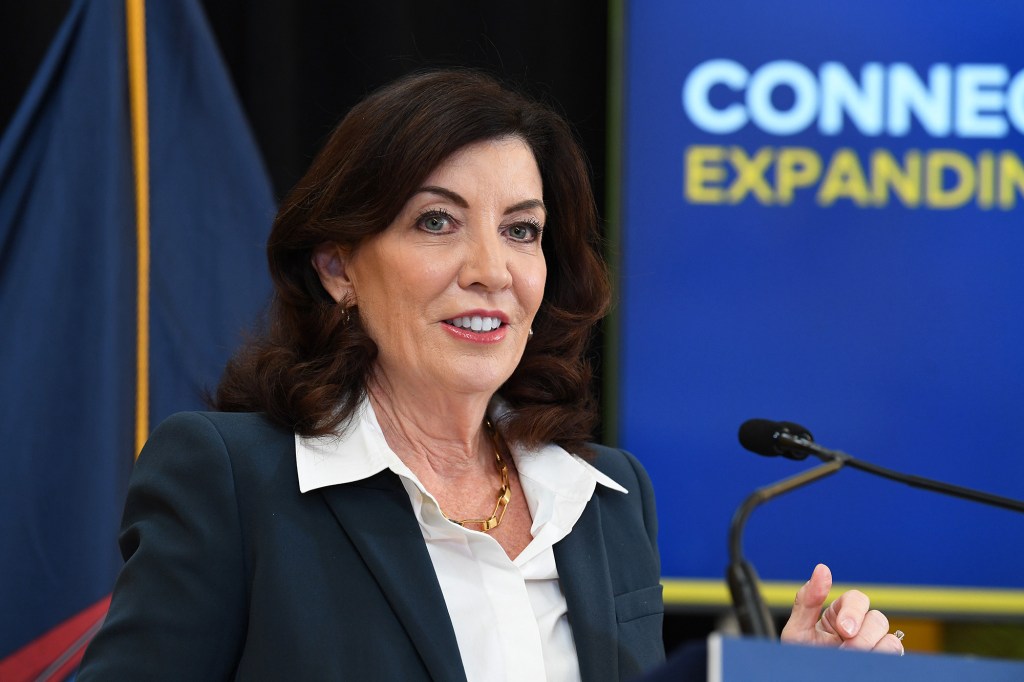 Hochul speaking at a podium