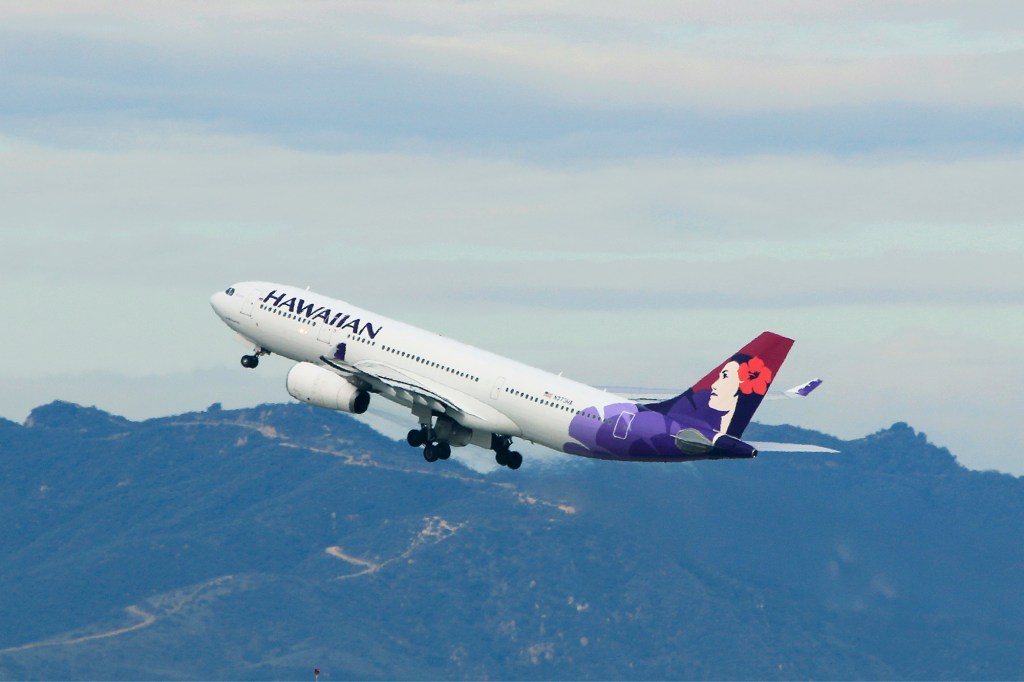 Los Angeles, CA, USA - December 26, 2016: Hawaiian Airlines Airbus A330 Aircraft take-off at Los Angeles International Airport (LAX).