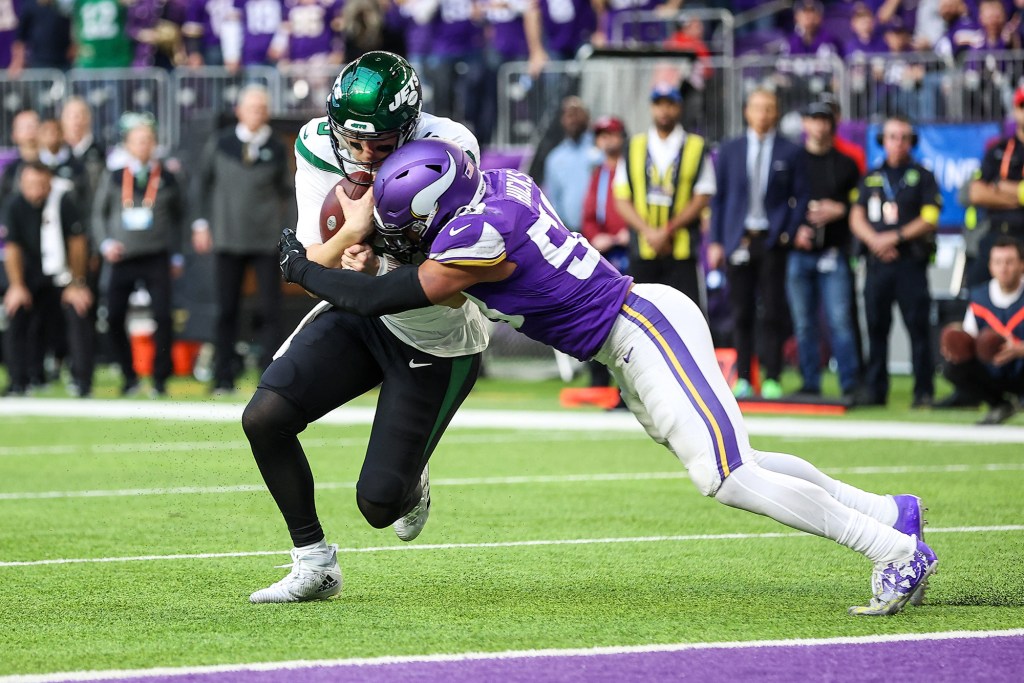 Jets quarterback Mike White runs against the Vikings on Dec. 4, 2022.