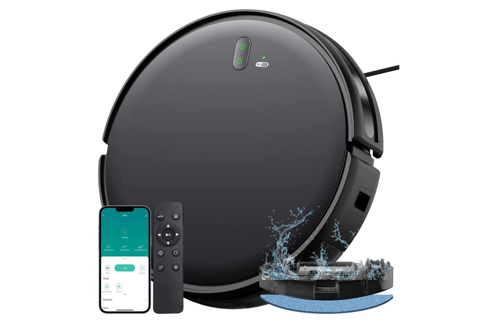 Black robot vacuum. 