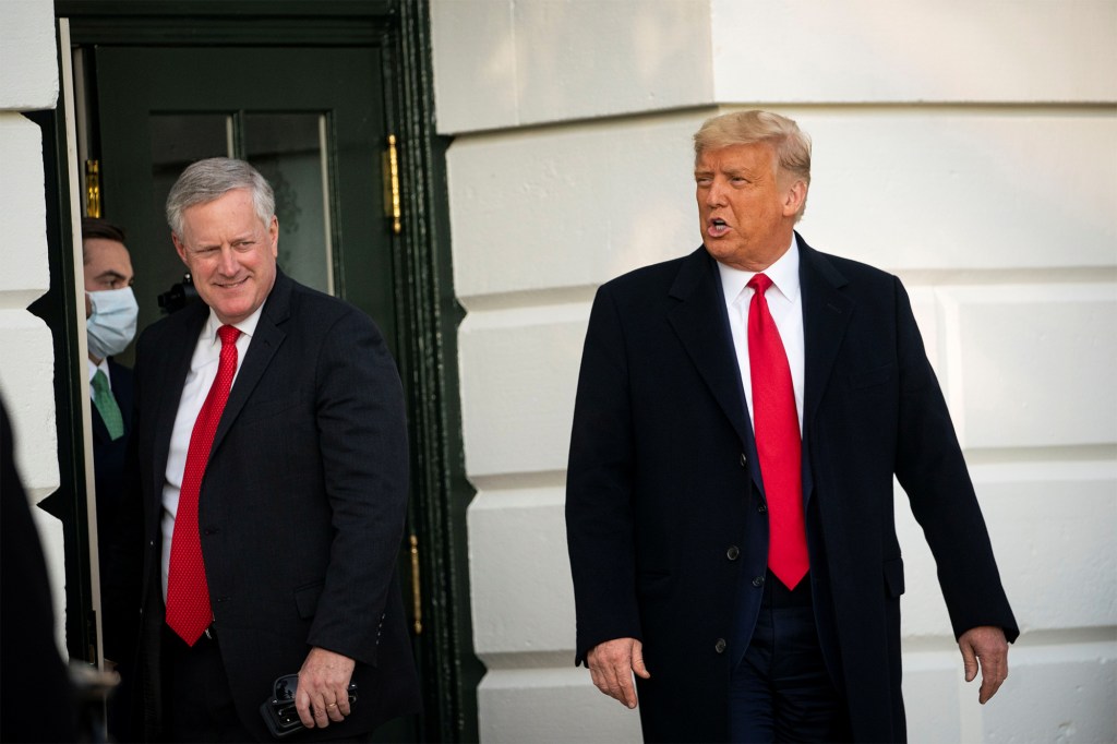 U.S. President Donald Trump departs with White House Chief of Staff Mark Meadows from the White House to travel to North Carolina for an election rally, in Washington, U.S., October 21, 2020.