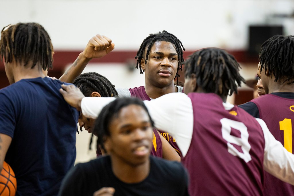 Christ the King high school basketball player Brandon Gardner, center, practices with the team, Friday, Jan. 27, 2023, in Queens, NY.