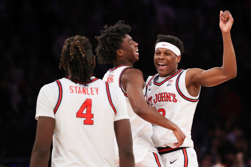 AJ Storr (#2) celebrates after St. John's beat Georgetown on Sunday. 