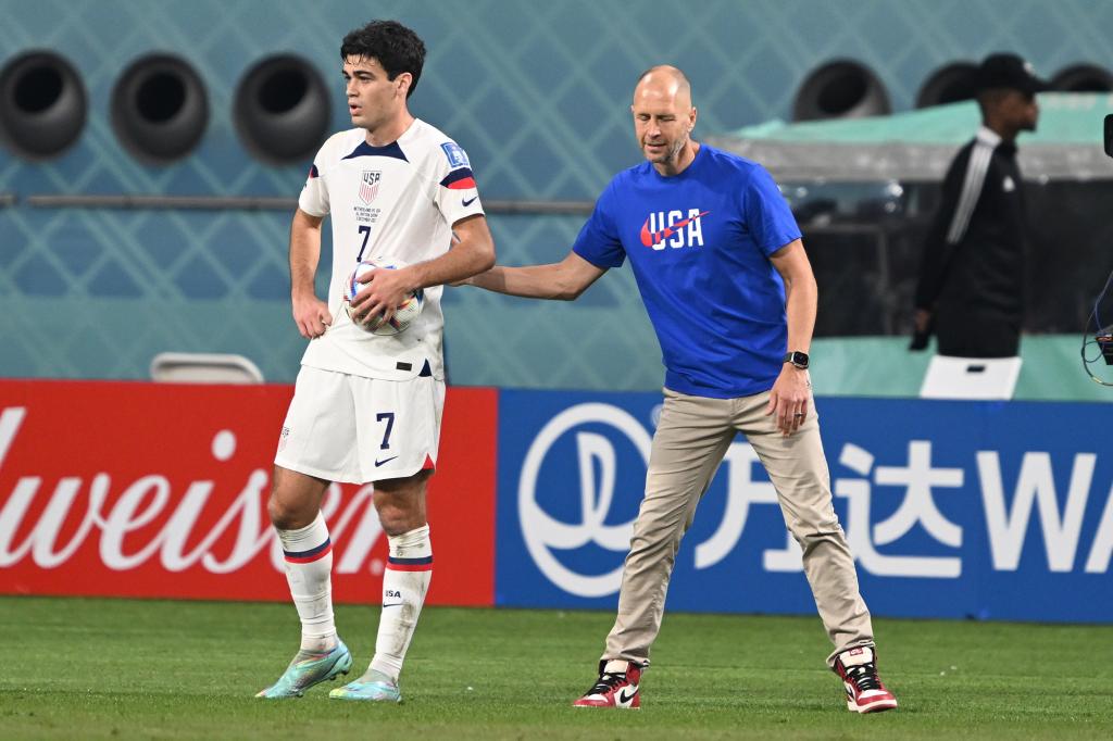 Gio Reyna (l.) and Gregg Berhalter (r.) during the USMNT's World Cup amtch against the Netherlands on Dec. 3, 2022.