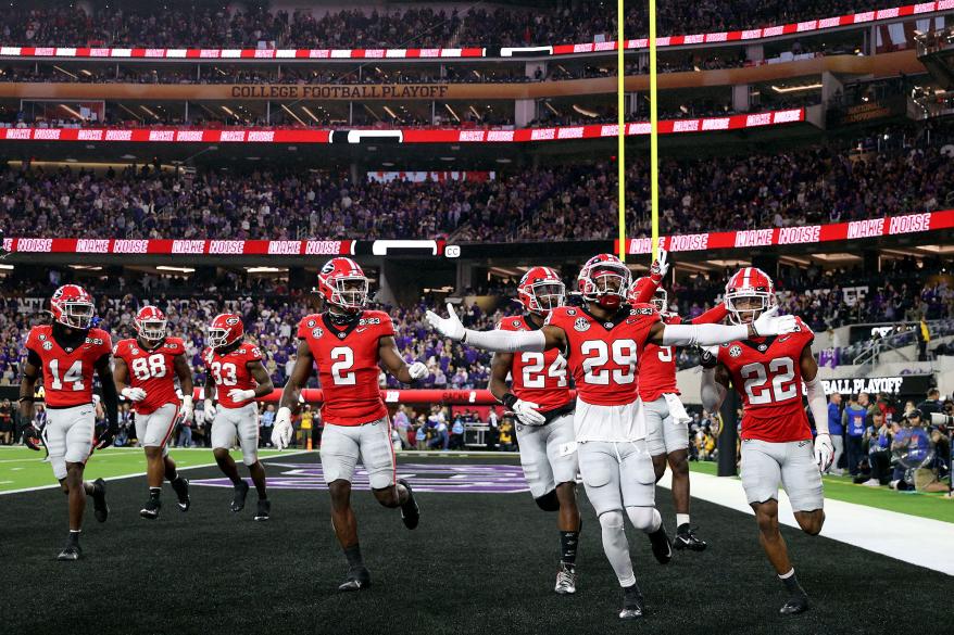 eorgia Bulldogs defensive back Christopher Smith (29) celebrates after defensive back Javon Bullard (22) made an interception against the TCU Horned Frogs during the second quarter of the CFP national championship game at SoFi Stadium. Getty Images