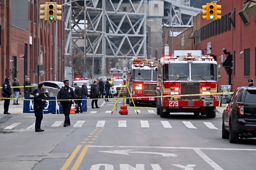 FDNY vehicles and NYPD cops respond to the scene.