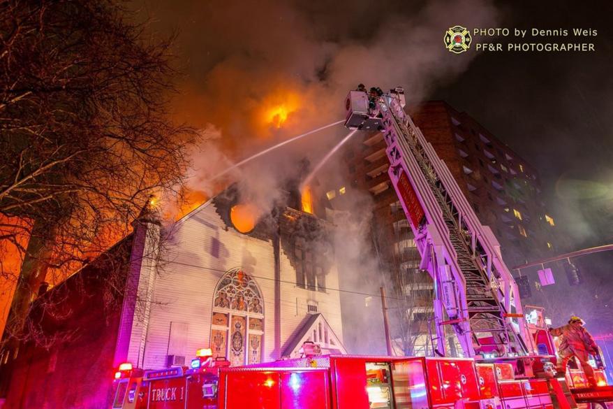 A picture of a historic church in Portland on fire.