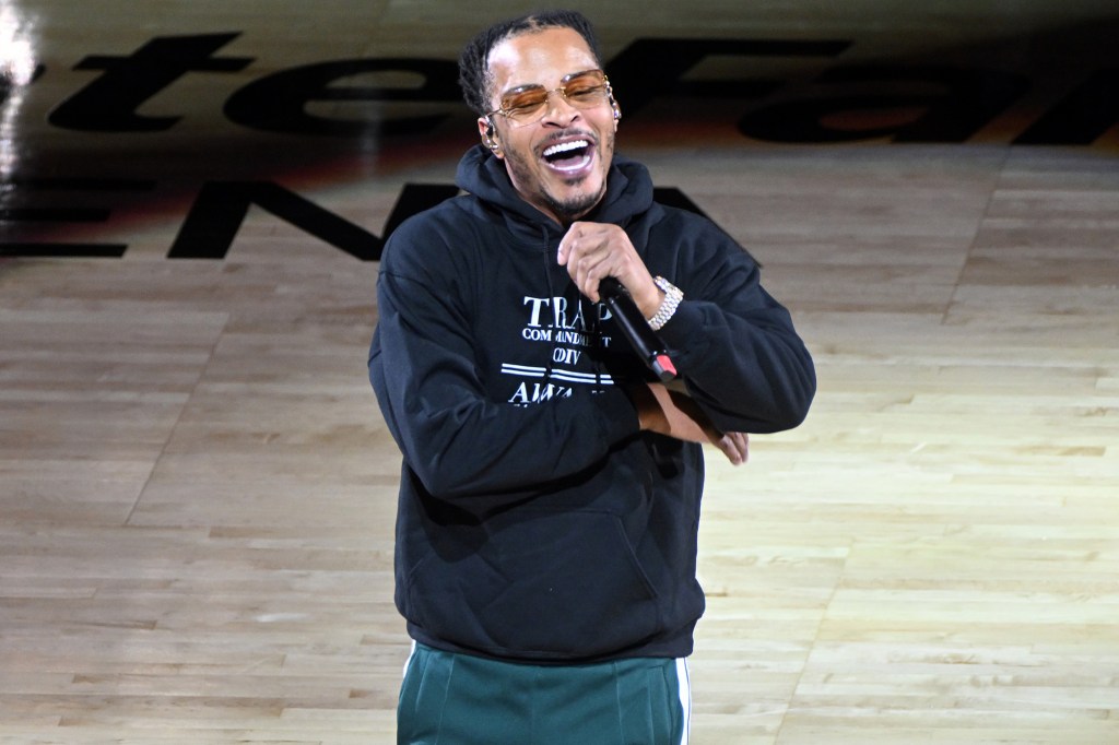 Rapper T.I. performs at halftime during the game between the Sacramento Kings and the Atlanta Hawks at State Farm Arena on November 23, 2022