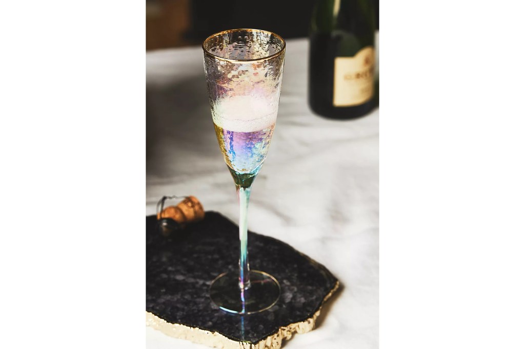 iridescent champagne flute with beverage inside