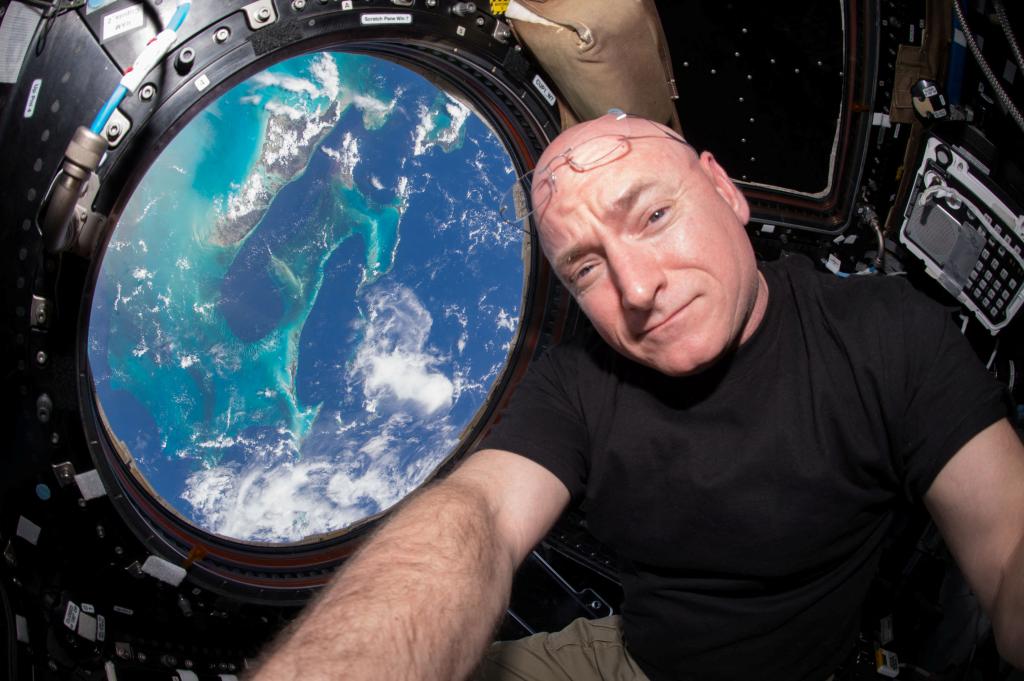 Scott Kelly is seen inside the Cupola, a special module which provides a 360-degree viewing of the Earth and the space station, aboard the International Space Station, July 12, 2015.