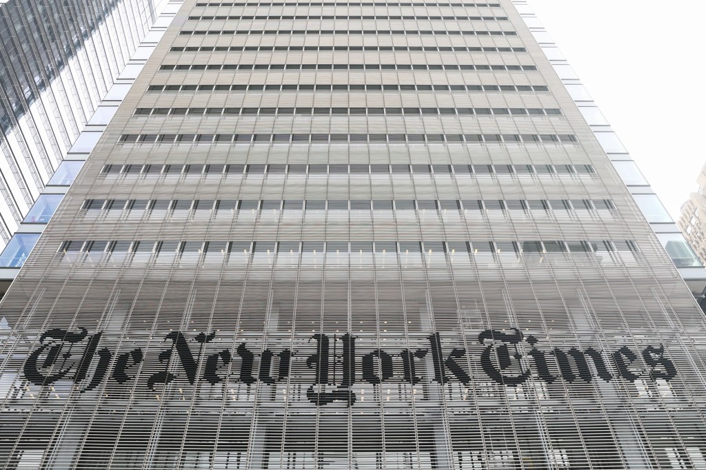 The New York Times logo is seen on the building in New York City, United States on October 27, 2022. 