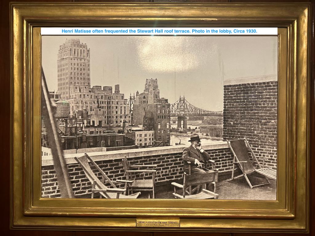 An image of Matisse himself painting on the roof of the building.