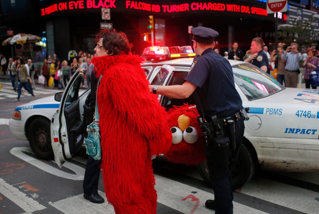 Elmo being arrested in New York City