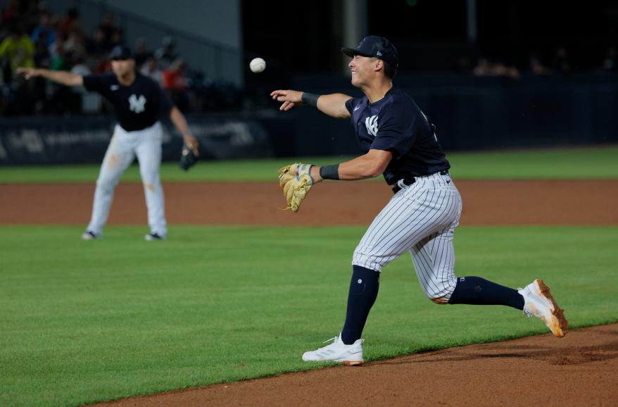 Anthony Volpe makes a throw during the Yankees' spring training game against the tigers on Feb. 27.