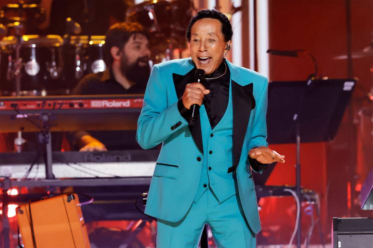 Smokey Robinson entertains onstage.