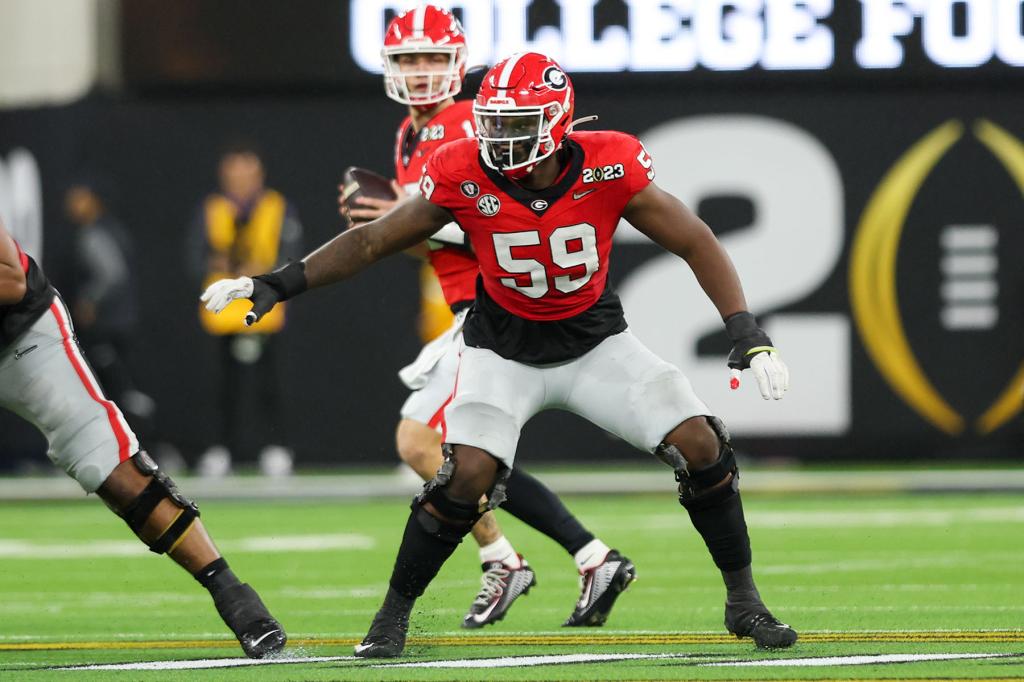 Georgia Bulldogs offensive lineman Broderick Jones (59) looking to make a block during the Georgia Bulldogs game versus the TCU Horned Frogs in the College Football Playoff National Championship game on January 9, 2023, at SoFi Stadium in Inglewood, CA.