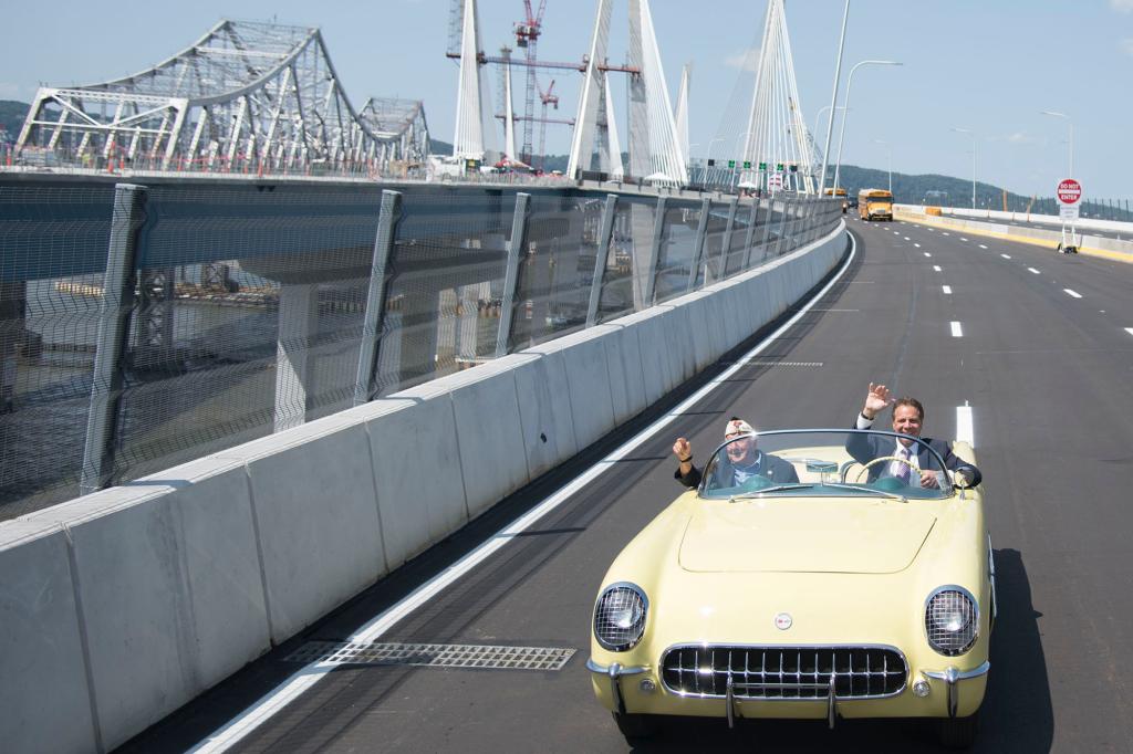 Chick Galella, a WW2 veteran and Pearl Harbor survivor rides in a '55 Corvette Stingray with then-Governor Cuomo.