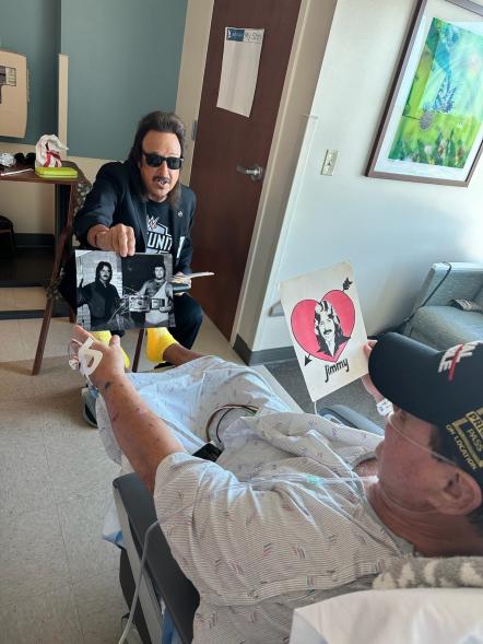 Jimmy Hart with Jerry Lawler in the hospital after Lawler suffered a stroke.