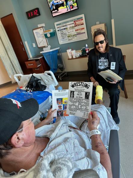 Jimmy Hart with Jerry Lawler in the hospital after Lawler suffered a stroke.