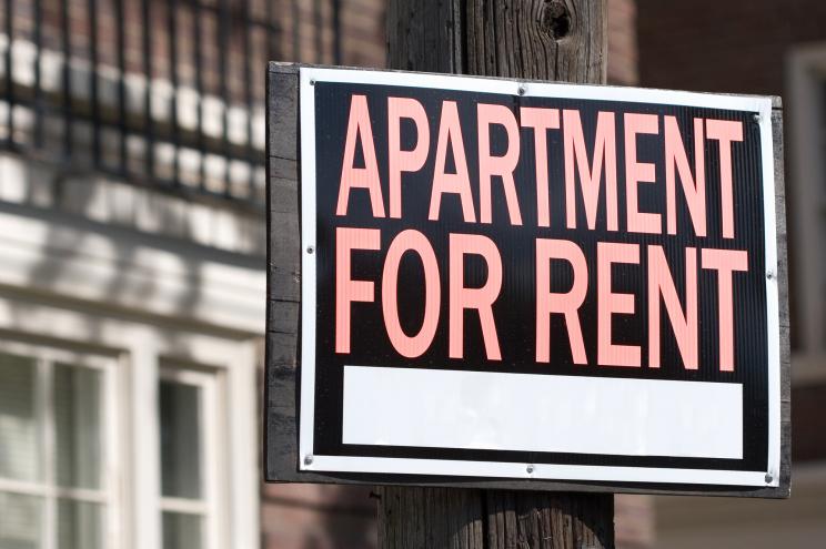 Apartment for rent sign.