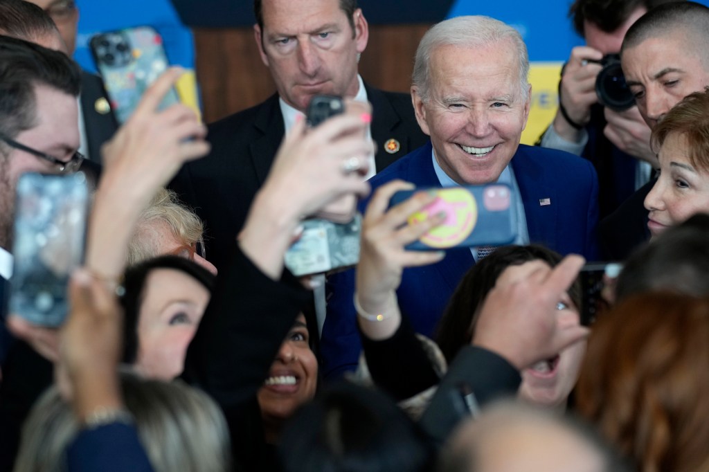 President Joe Biden greets people after speaking about health care and prescription drug costs at the University of Nevada, Las Vegas.