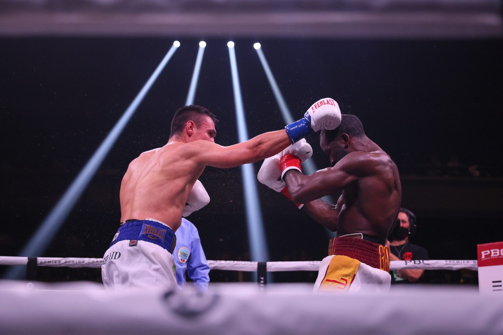 Tim Tszyu, left, punches Terrell Gausha during their bout on March 26, 2022.