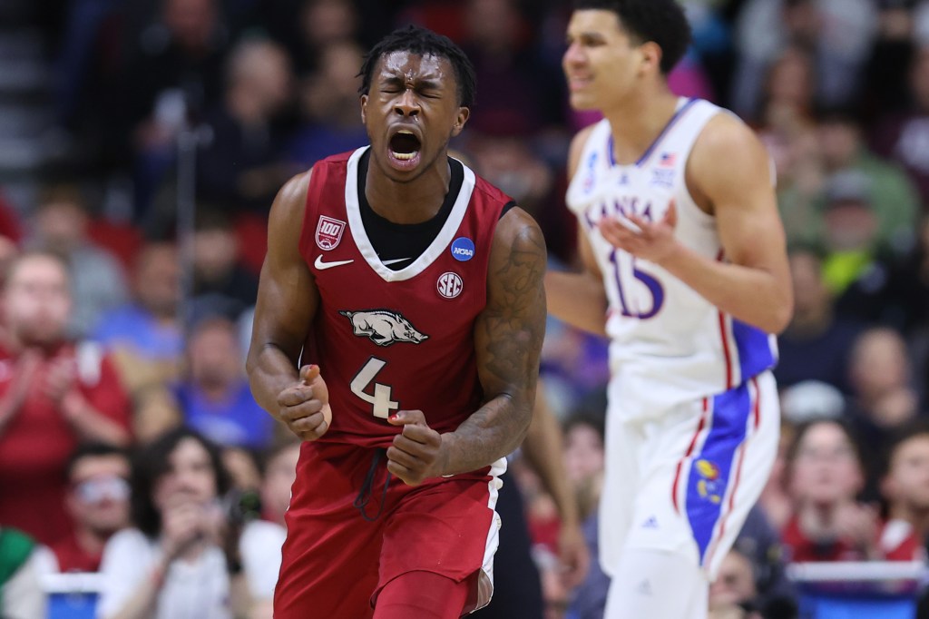 Davonte Davis #4 of the Arkansas Razorbacks reacts against the Kansas Jayhawks during the second half in the second round of the NCAA Men's Basketball Tournament at Wells Fargo Arena on March 18, 2023 in Des Moines, Iowa. 