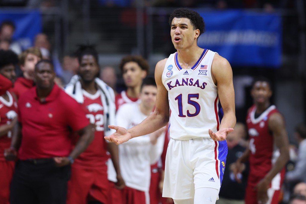 Kevin McCullar Jr. #15 of the Kansas Jayhawks reacts against the Arkansas Razorbacks during the second half in the second round of the NCAA Men's Basketball Tournament at Wells Fargo Arena on March 18, 2023 in Des Moines, Iowa.