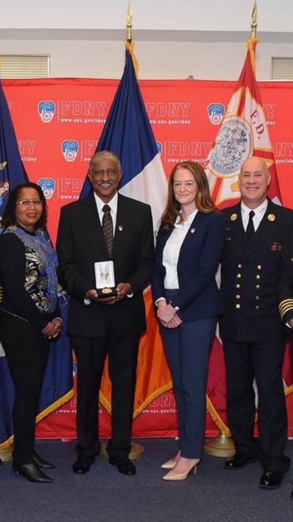 Photo of plaintiff Michael Gala and FDNY Commissioner Kavanaugh.