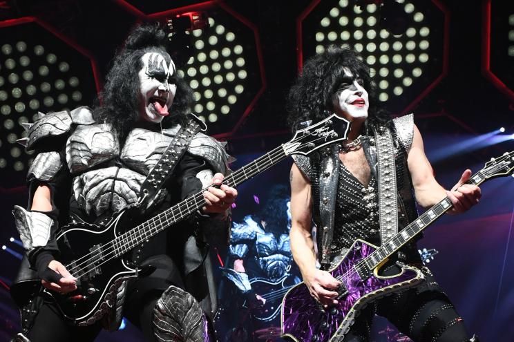 Gene Simmons (L) and Paul Stanley rock out onstage.