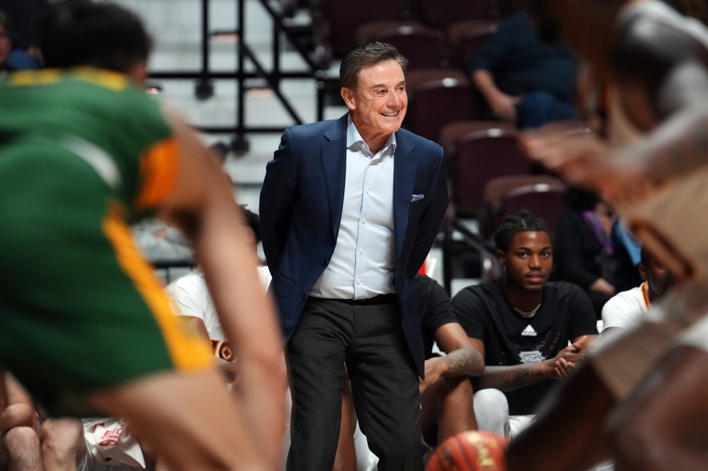  Iona Gaels head coach Rick Pitino smiles during game play