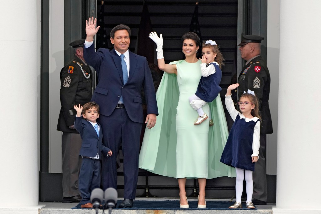 Florida Gov. Ron DeSantis, second from left, waves as he arrives with his wife Casey, right, and their children Mason, Madison, and Mamie during his inauguration ceremony outside the Old Capitol Tuesday, Jan. 3, 2023, in Tallahassee, Fla.