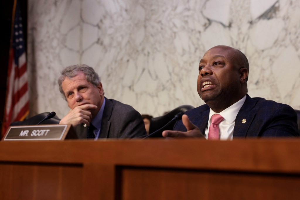 Sen. Tim Scott (R-SC), right, Ranking Member, joined by Chairman Sen. Sherrod Brown (D-OH)