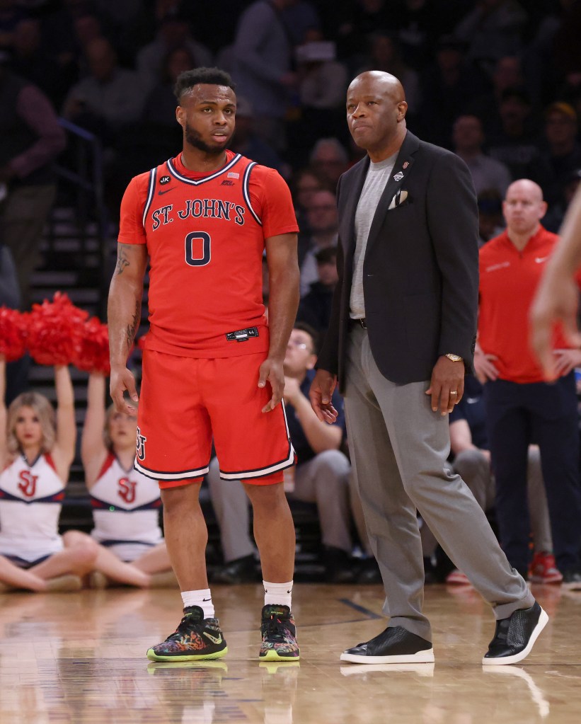 Mike Anderson (r.) with guard Posh Alexander (0) during St. John's Big East Tournament loss to Marquette on March 9, 2023.