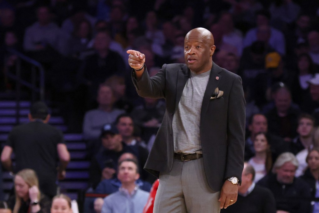 Red Storm head coach Mike Anderson reacts on the court