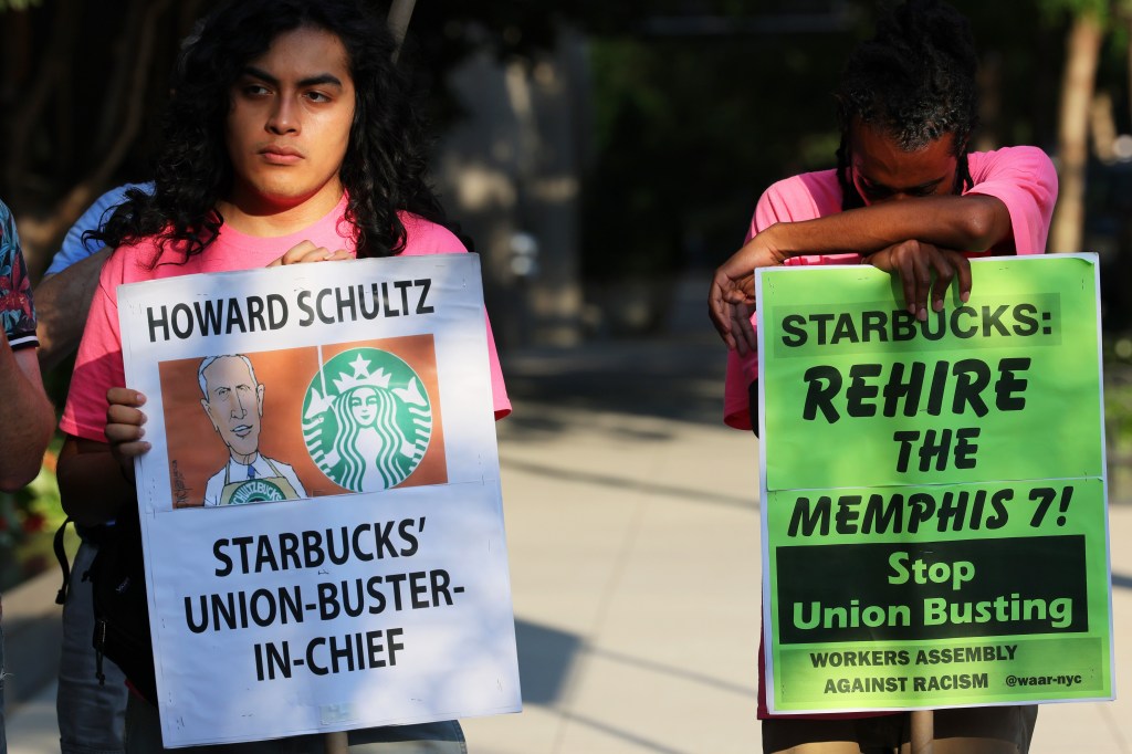 Protestors picketing Starbucks.