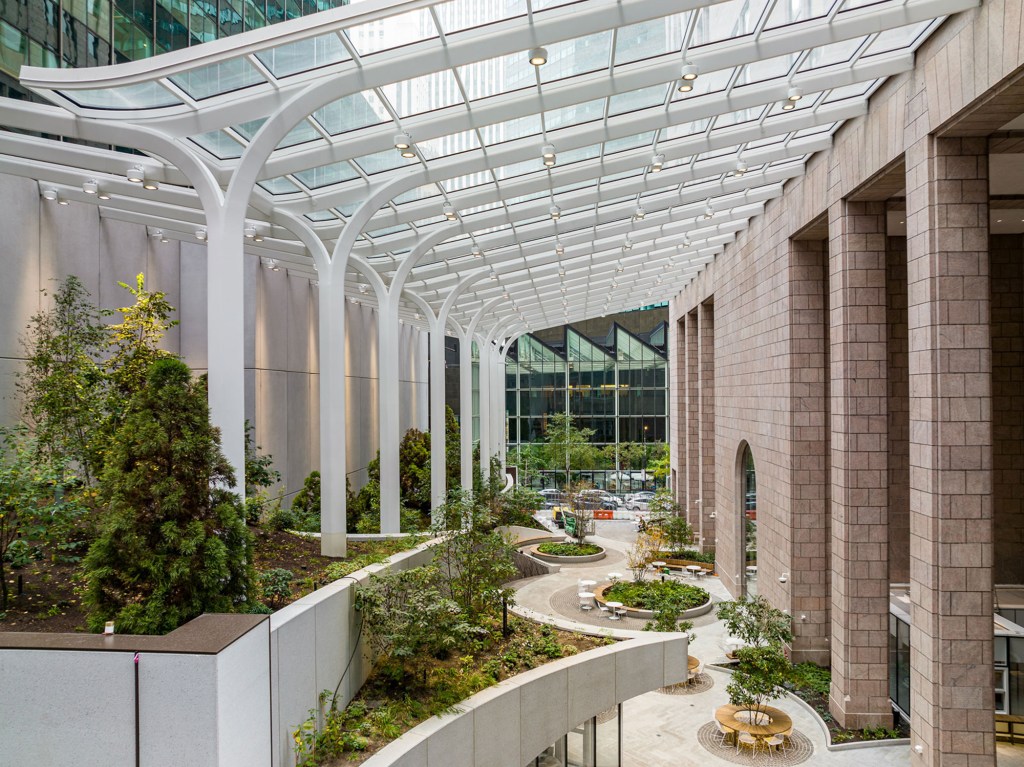 An atrium at 550 Madison Ave., the address for LVMH's new HQ.