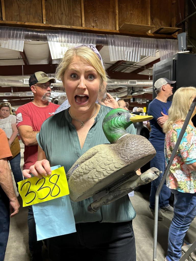 A shopper gapes at a pair of boots owned by Alex Murdaugh.