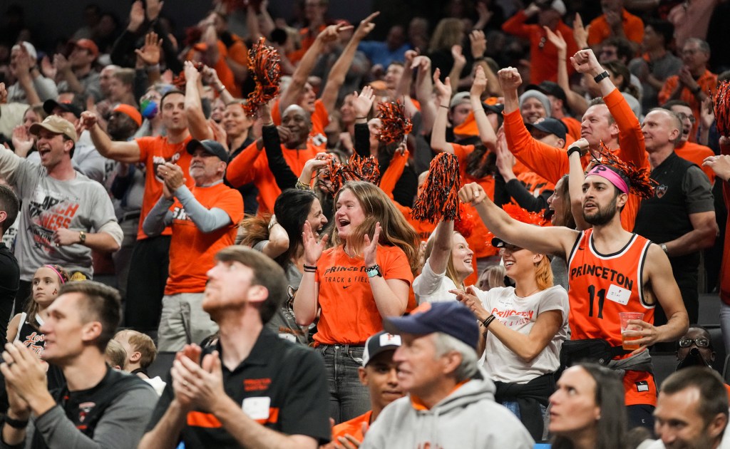 Princeton fans celebrate during their team's victory.