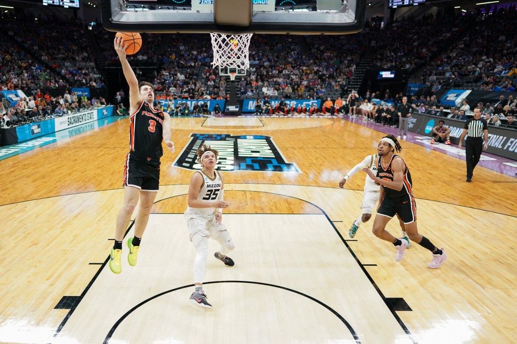 Ryan Langborg, who scored a game-high 22 points, goes up for a layup during Princeton's 78-63 upset win over Missouri.