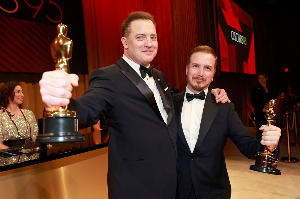 Brendan Fraser (left) won Best Actor in a Leading Role, and Adrien Morot took home Best Makeup and Hairstyling, both for "The Whale." 