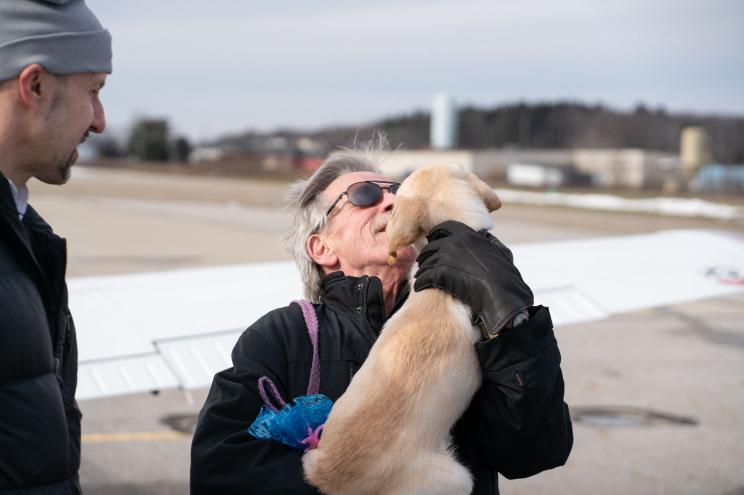 Guiding Eyes for the Blind puppy raiser Keith with Fenway.